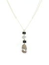 Close-up detail of the Stepping Stone Pendant Necklace silver chains and black pendant by Fair Anita