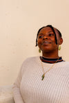 Close-up of Stevie Dangle Earrings showing double brass and recycled glass detail by Fair Anita