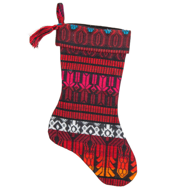 Add a touch of global elegance to your holiday decor with our handcrafted Guatemalan Brocade Christmas Stocking. Made from sustainable materials and featuring intricate patterns, this stocking is perfect for any home. Order yours today!