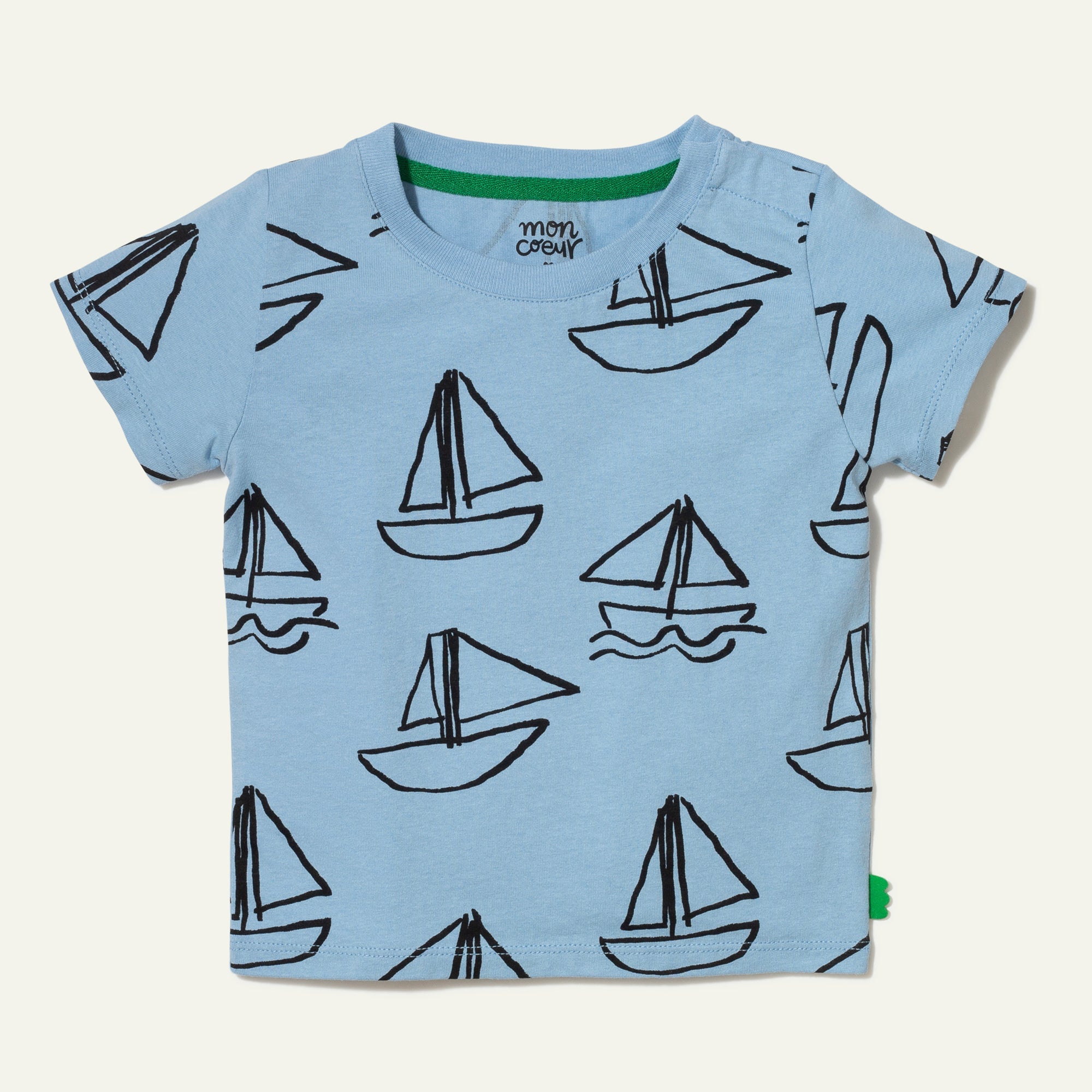 Light blue t-shirt with black sailboat pattern on a white background