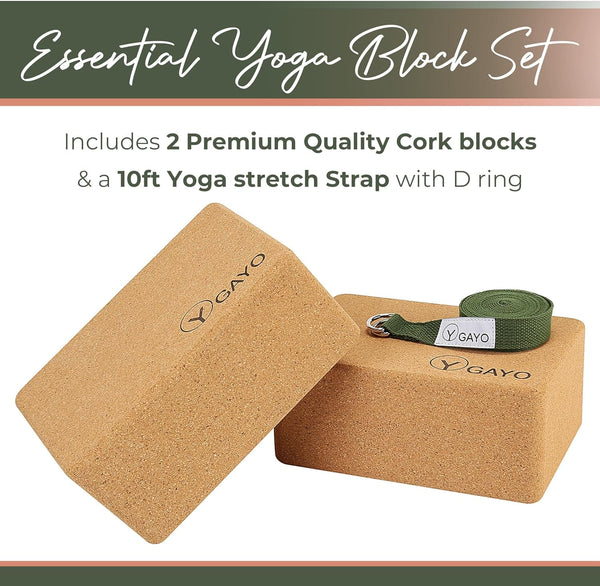 Yoga block set with cork blocks and a yoga strap on a white background