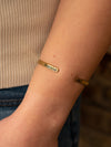 Ethically handcrafted feminist cuff bracelet in recycled brass