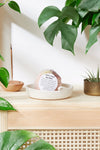 Close-up of organic crystal bath bomb with hidden crystal inside, SLS-free and made with organic essential oils