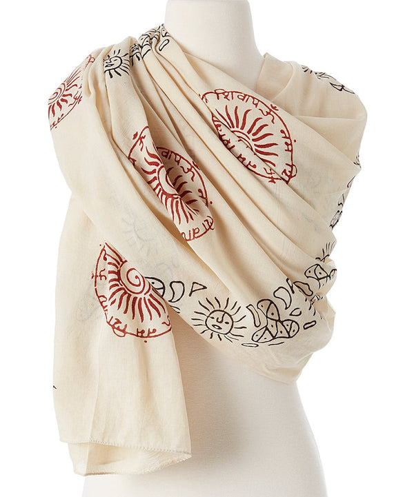 OMSutra Surya Prayer Shawl in natural cream and red with sun motifs, made from fine luxurious cotton — ideal for meditation and yoga