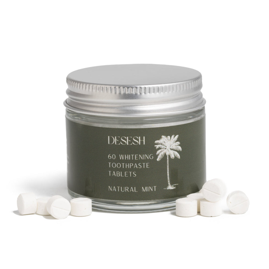 Desesh whitening toothpaste tablets with hydroxyapatite in a reusable glass jar with metal lid