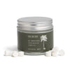Desesh whitening toothpaste tablets with hydroxyapatite in a reusable glass jar with metal lid
