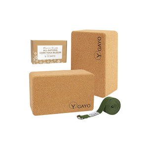 Gayo sustainable large cork yoga blocks and adjustable green strap set on a white background