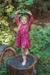 Close-up detail of the Woodland Dreams bamboo blend twirly dress print featuring enchanted trees and moons