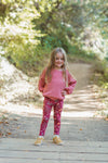 Child wearing Apple Park Woodland Dreams bamboo organic cotton leggings — slim fit with stretchy elastic waistband