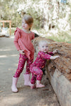 Close-up of Apple Park Woodland Dreams leggings on a child showing soft bamboo fabric and all-over woodland print detail