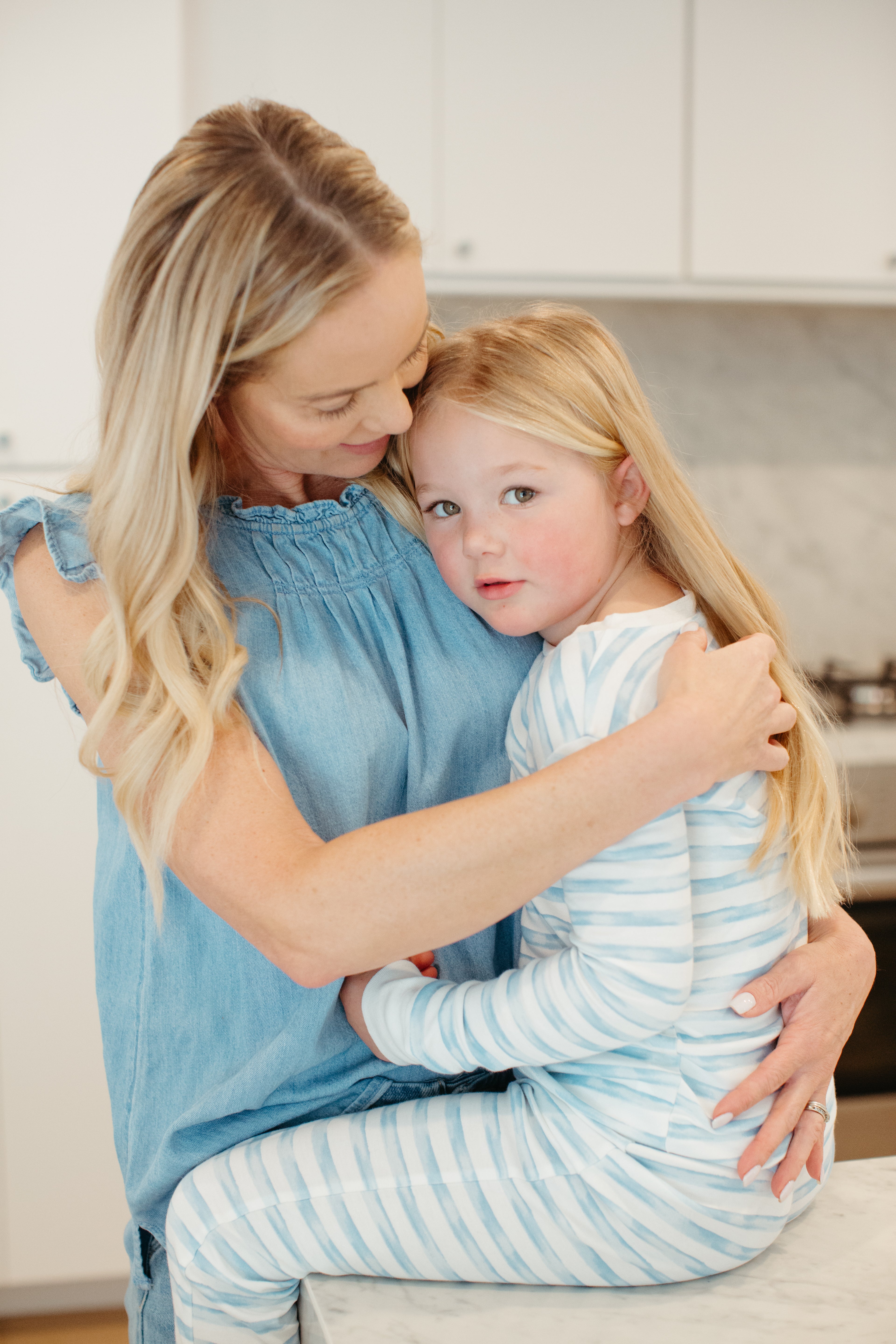 Child wearing Apple Park Breezy Bay Stripe two-piece bamboo pajamas — long sleeve top and matching stripe pants