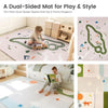 Dual-sided play mat for children with different designs on a light background