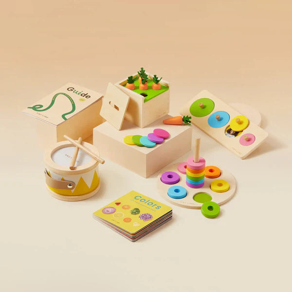 Set of wooden educational toys on a beige background