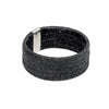 Solid Cuff bracelet in black with woven palm leaf and sterling silver tips