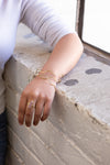 Tidalwave Hammered Brass Bangle Set styled with an adjustable brass ring – stackable fair trade jewellery by Fair Anita