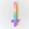 Colorful sword-shaped object with a gradient from pink to purple on a white background