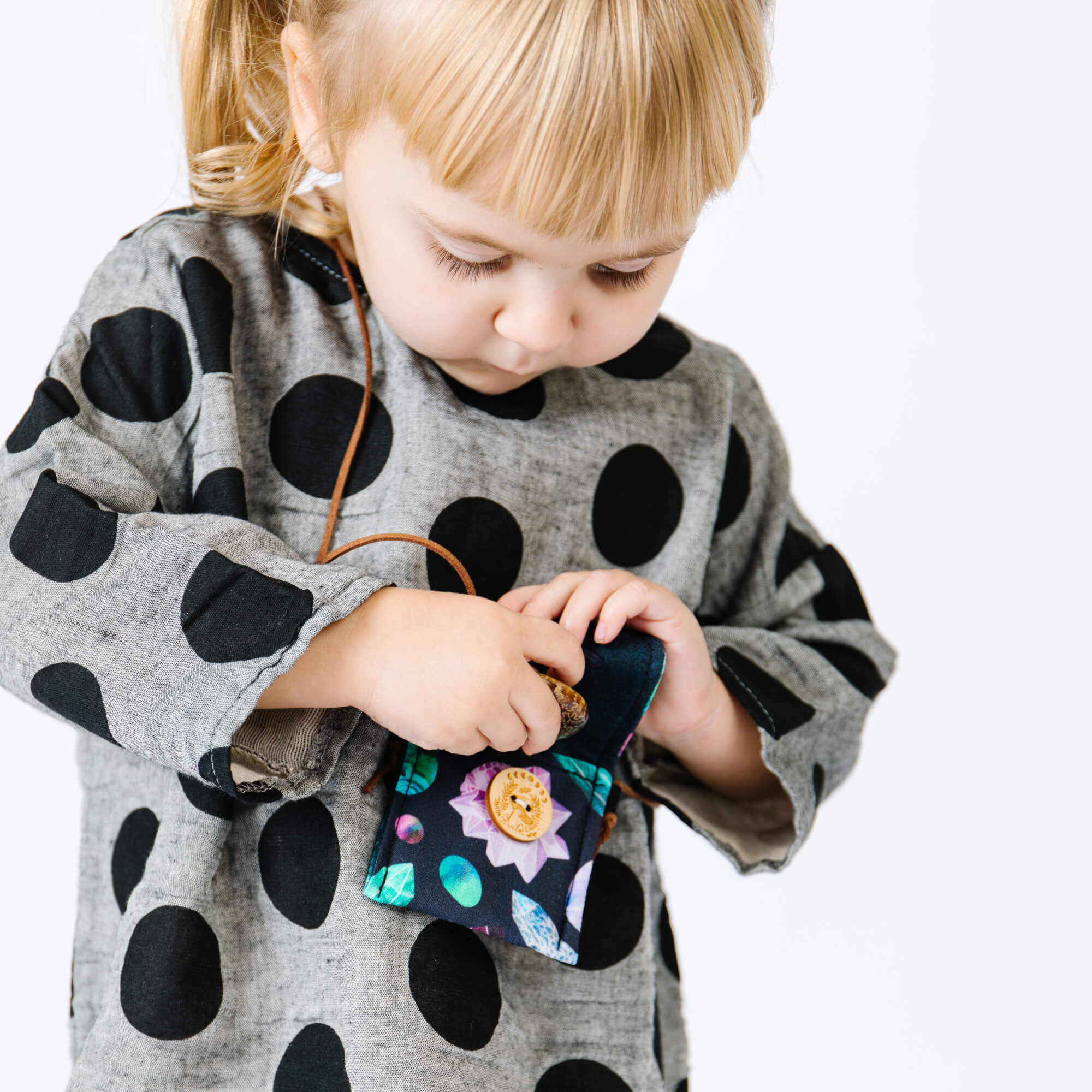 Children's treasure pouch with felt lining for storing crystals, stones, and nature finds