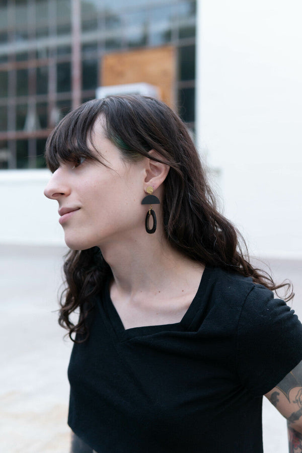 Model wearing Fair Anita oval horn earrings — nickel-free, ethically handmade in India