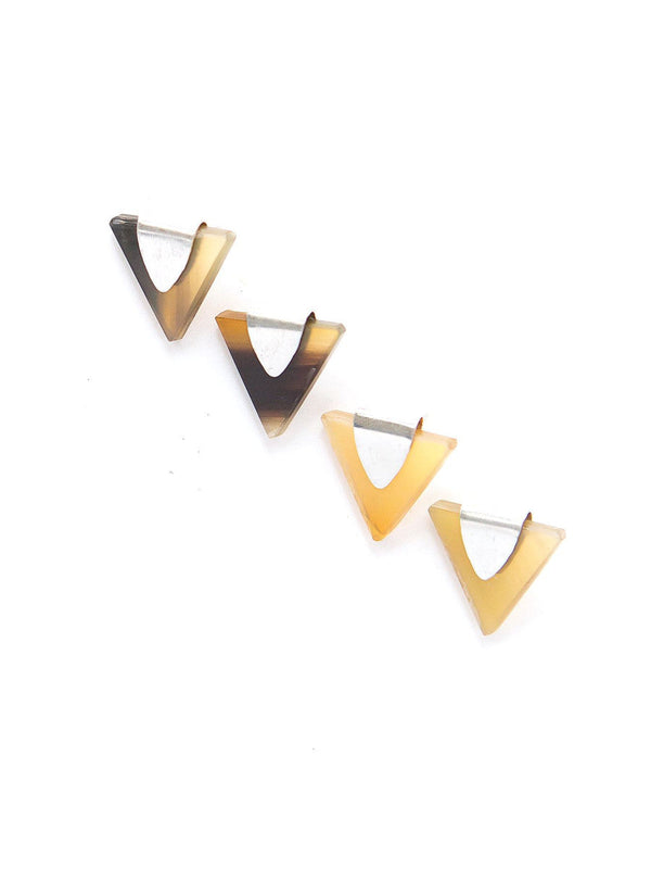 Fair Anita silver triangle horn stud earrings styled on model — handmade in India