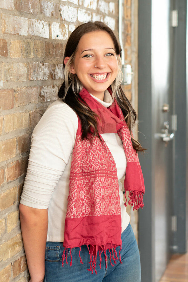 Close-up of raspberry woven scarf texture handcrafted by women artisans in Vietnam