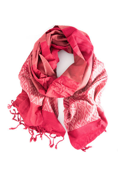 Flat lay of the Tuyen woven raspberry scarf showing full 70 by 20 inch dimensions and viscose fabric