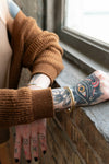 Fair Anita Twisted Cuff bracelet in brass-plated recycled metal, handmade by women artisans in India