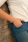 Nickel-free self love quote cuff in silver-plated recycled metal on wrist