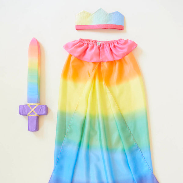 Rainbow-themed dress with matching accessories on a white background