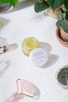 Butter Me Up Organics under eye balm jar showing certified organic caffeinated formula