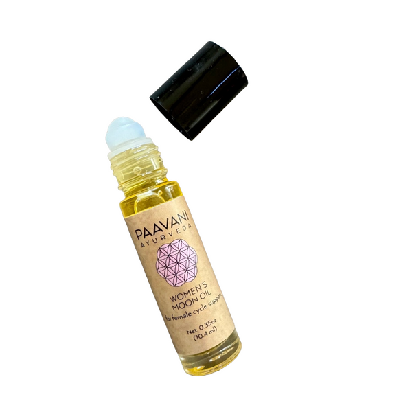 Roll-on bottle of Paavani Ayurveda Women's Moon Oil on a white background