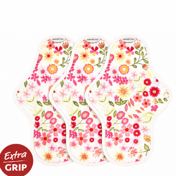Close-up of hannah reusable period pad showing non-slip silicone backing, hypoallergenic snaps and breathable TPU inner lining