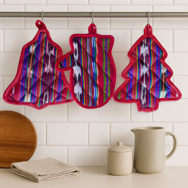 Holiday pot holder set of three handwoven cotton trivets shaped like a bell, mitten and Christmas tree