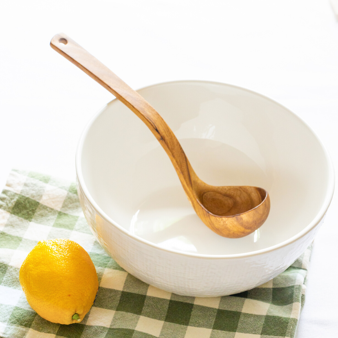 Enhance your cooking experience with our handcrafted Wood Ladle. Made from reclaimed wood, this stylish and functional ladle is perfect for serving soups, stews, and sauces.