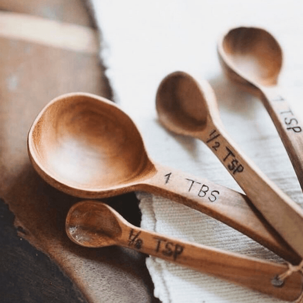 Enhance your cooking experience with our handcrafted Wood Measuring Spoon Set. Made from reclaimed wood and featuring precise measurements, these spoons are both functional and stylish.