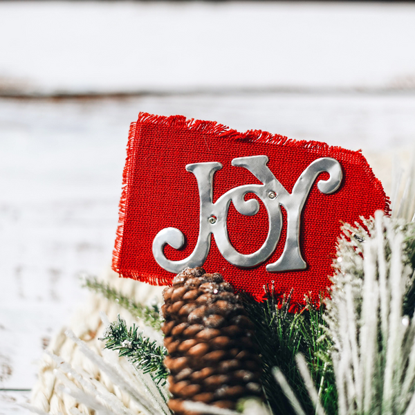 Add a festive and eco-friendly touch to your holiday gifts with our Recycled Aluminum Christmas Gift Tags. These handcrafted tags feature uplifting messages and are perfect for trees, packages, or homemade presents. Order yours today!