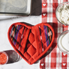 Protect your hands with love using our Heart-Shaped Pot Holder. This adorable and functional kitchen accessory is perfect for any occasion and supports fair trade practices.