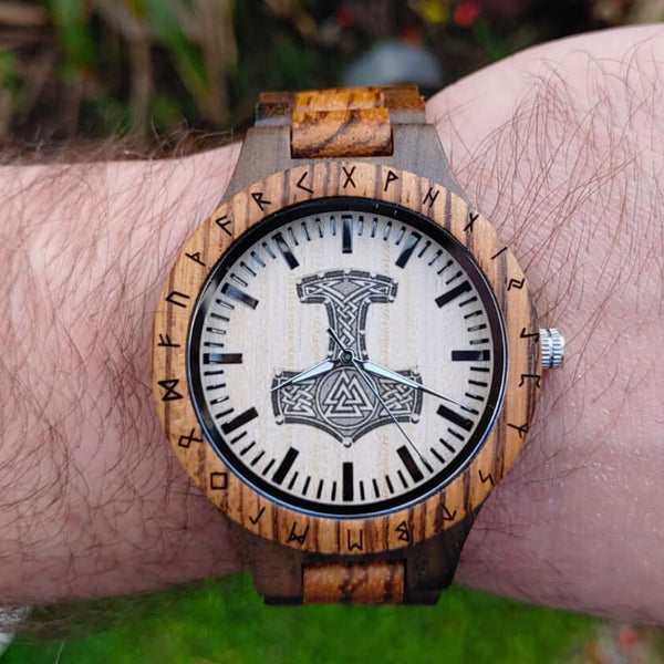 Custom Norse wooden watch showing back engraving with personalized message and Valknut knotwork