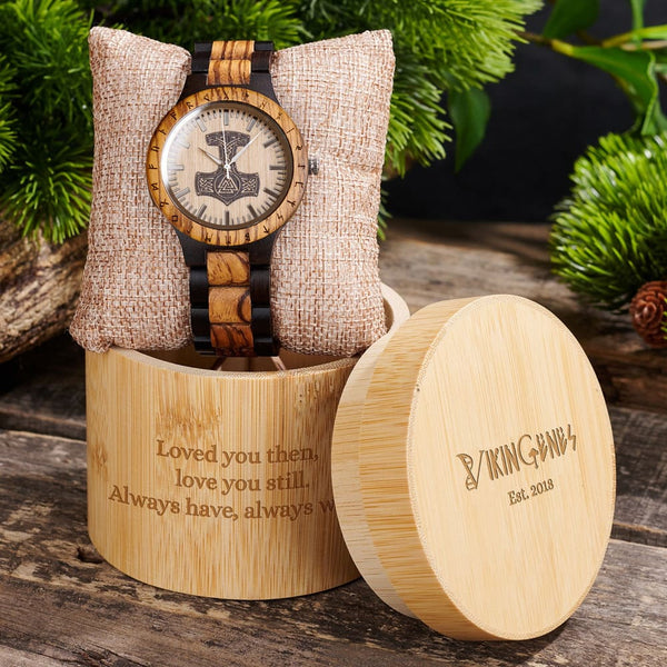 Wooden watch with decorative text and 'Biking Hand' branding on a wooden stand.