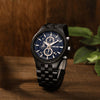 Custom engraved ebony wood watch shown open in personalized wooden gift box