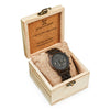 Wooden watch box with a watch inside, featuring the brand 'joycoast'.