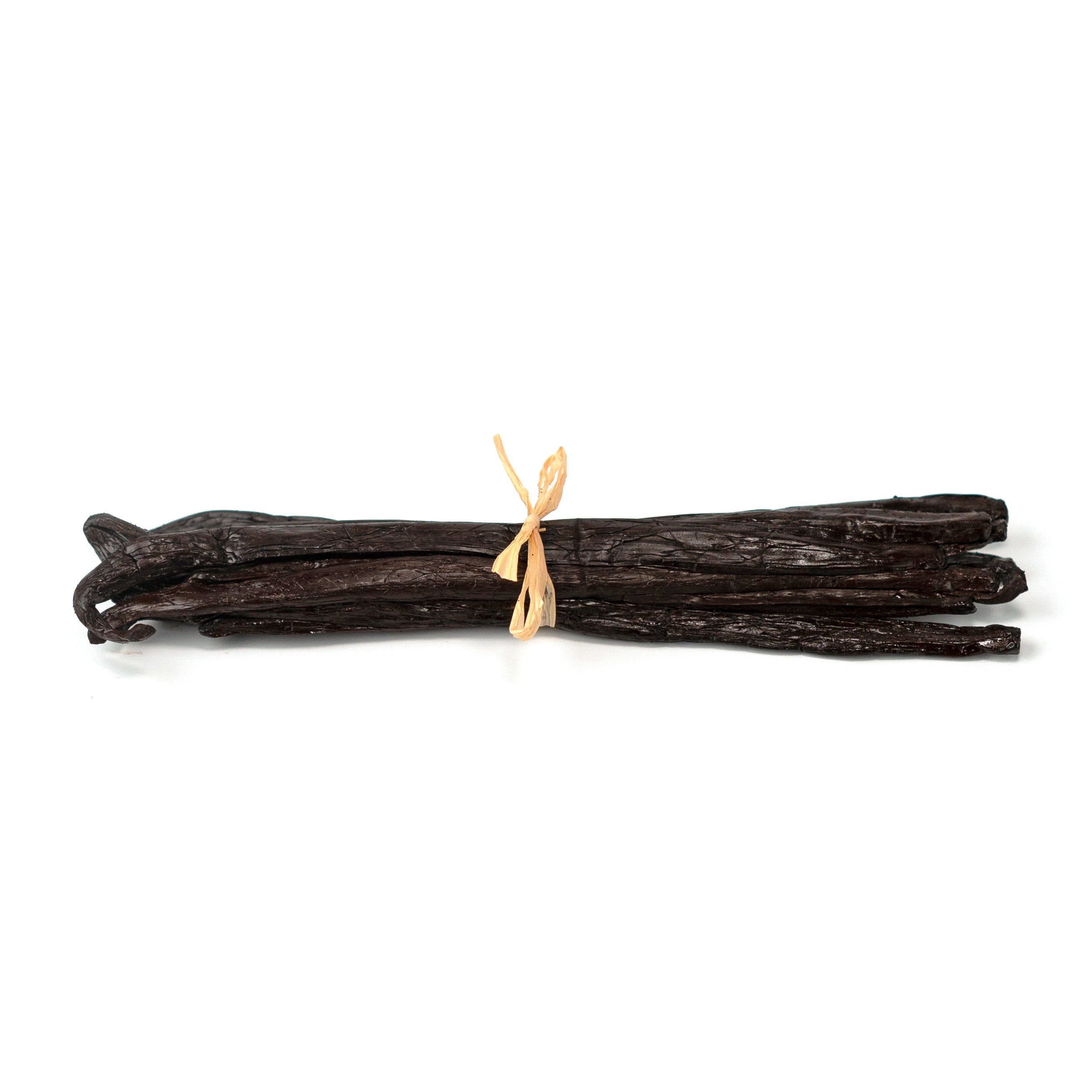 Bunch of vanilla beans tied with a ribbon on a white background