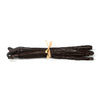 Bunch of vanilla beans tied with a ribbon on a white background