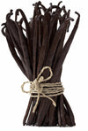 Bunch of vanilla beans tied with twine on a white background