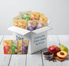 Box of Dové Oats vegan/no sugar added 16-pack with various flavors on a white background.