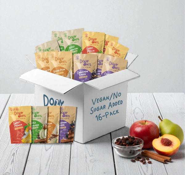 Box of Dové Oats vegan/no sugar added 16-pack with various flavors on a white background.