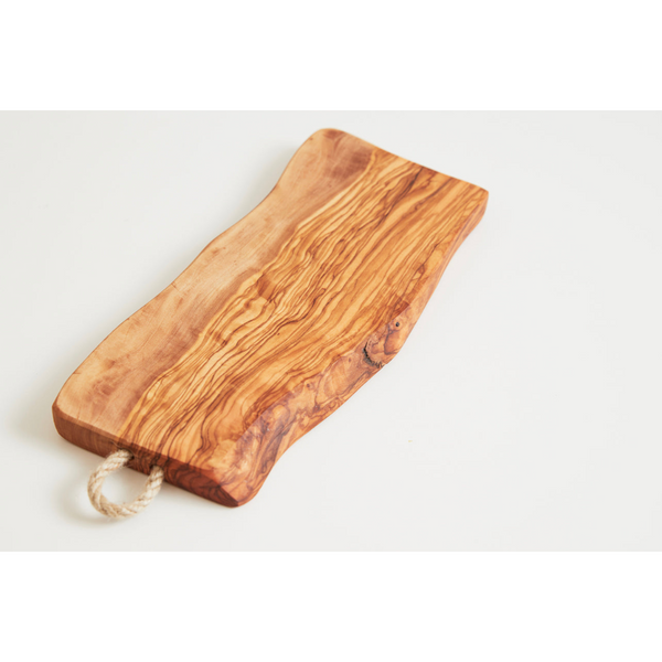 Verve Culture's Olivewood Charcuterie Board combines stunning design with exceptional functionality. Crafted from sustainable olivewood in Italy, this board is perfect for serving appetizers, cheese, and more.  Shop now and elevate your kitchen in style!