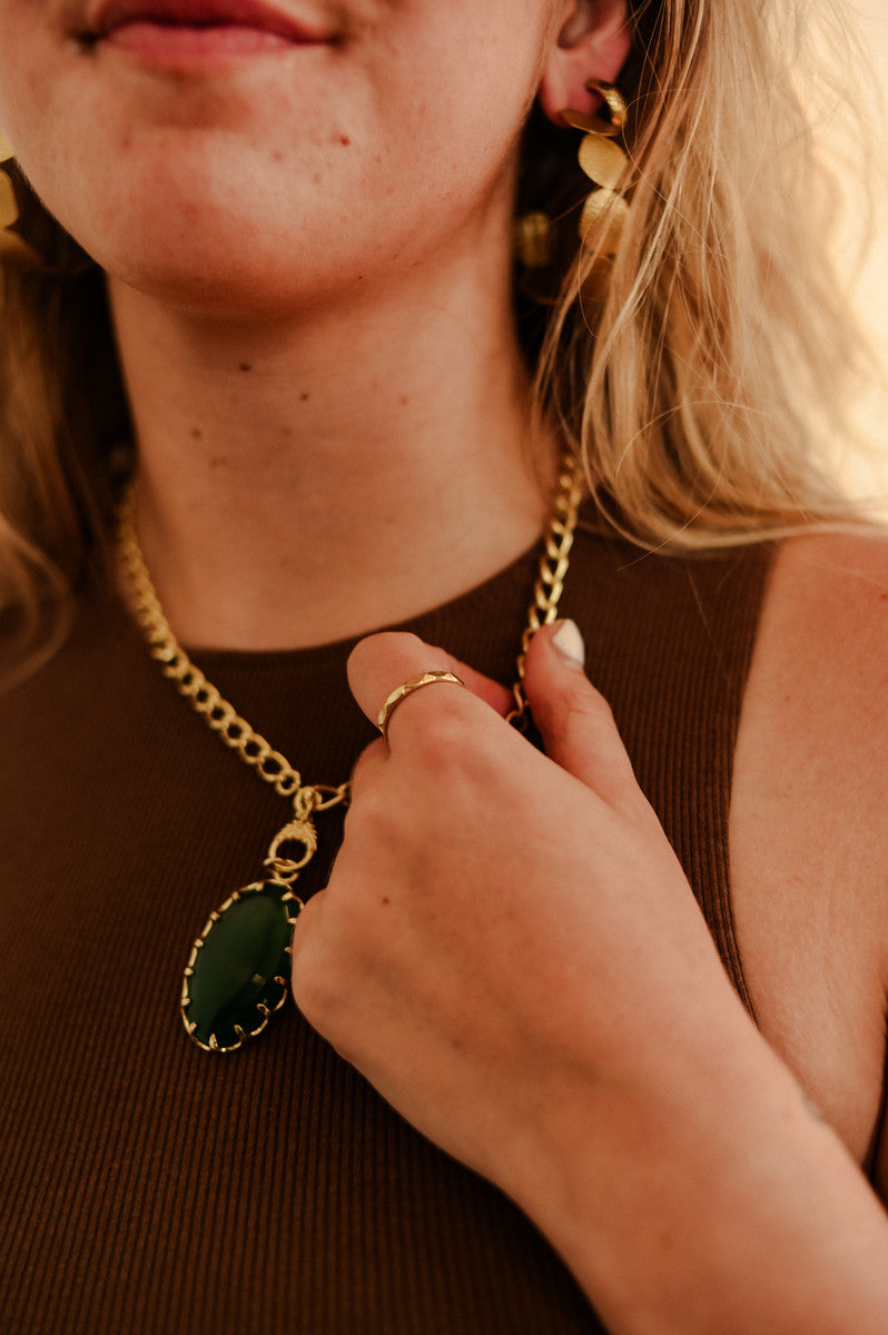 Vintage Crystal Stone Necklace worn as part of a fair trade jewellery collection including adjustable brass ring and crystal pendant necklace