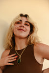 Close-up of Vintage Crystal Stone Necklace styled with Stone Path Hoop Earrings and Hammered Huggie Brass Hoops — fair trade jewellery set