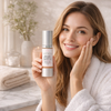 Close-up of Glimmer Goddess Vitamin C Serum dropper bottle showing certified organic and vegan label