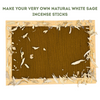 Incense-making kit with white sage leaves and wooden frame on a white background